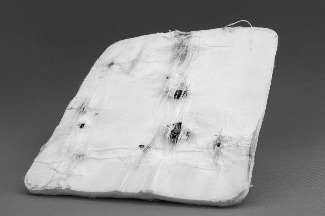 Composite armor plate — rounds captured on impact