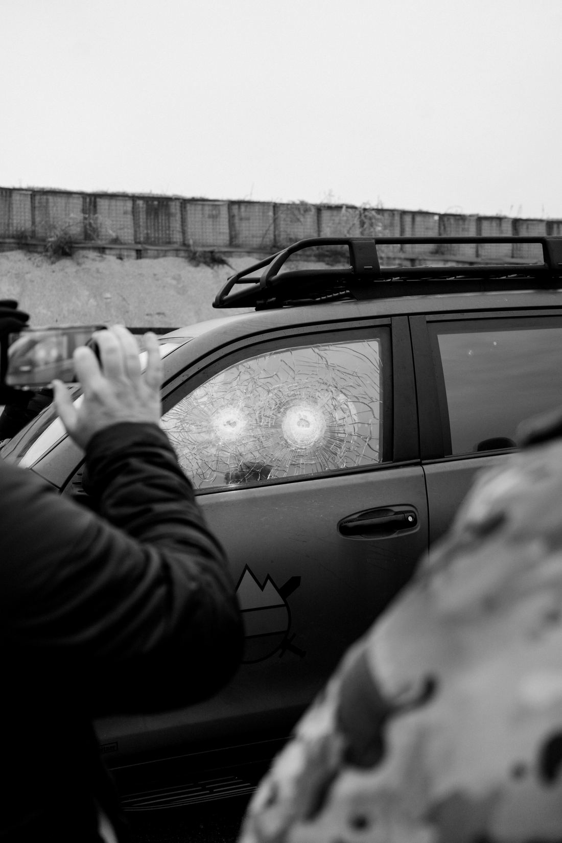 Fortis BR6 Land Cruiser — open door, three rounds stopped in the ballistic glass